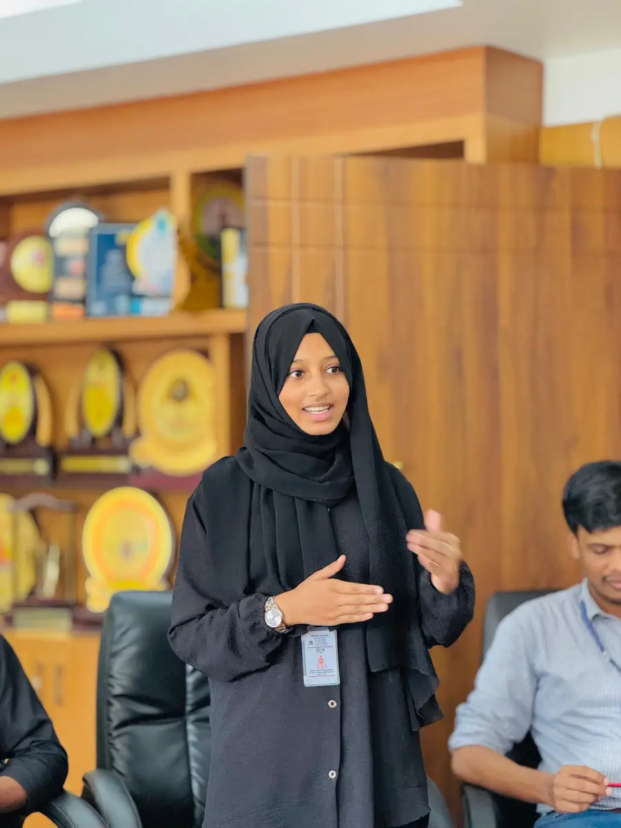 Shazia speaking during an occasion, co-founder of DeVoc